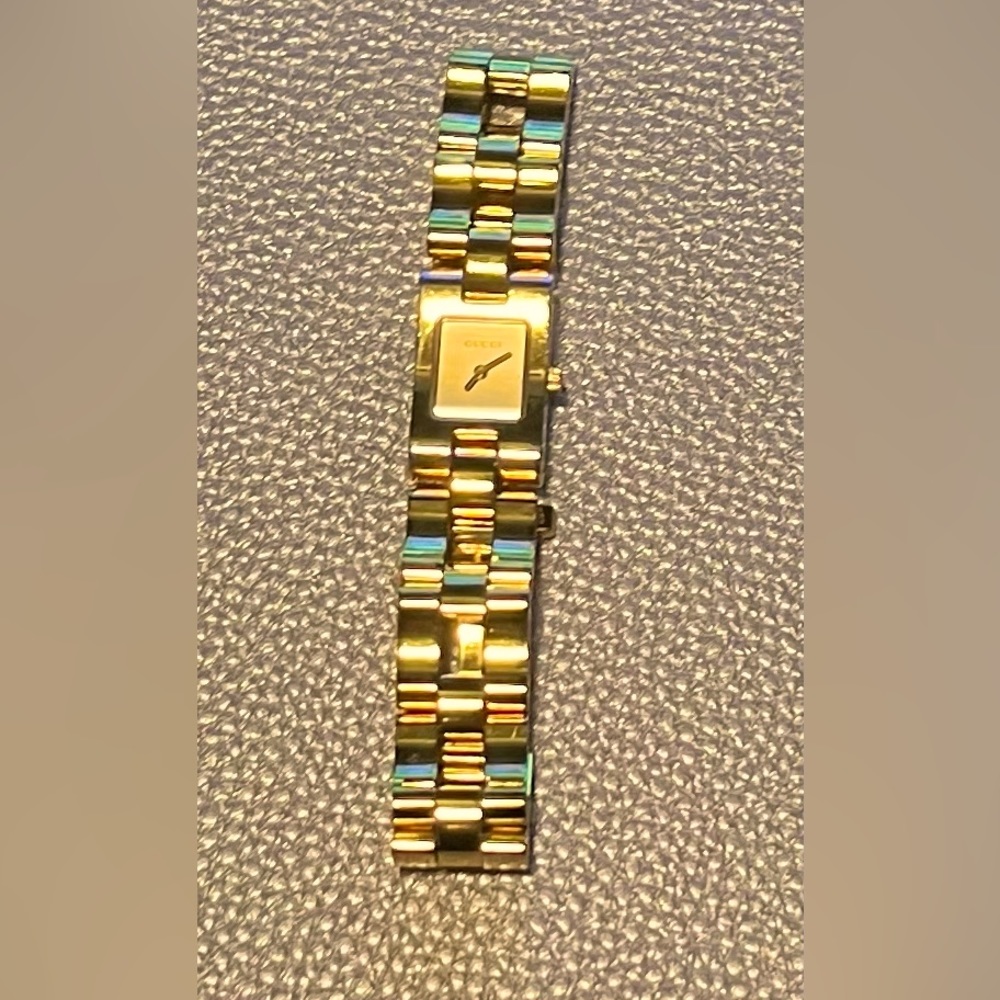 Woman’s Gucci Stainless Steel Watch Gold Finish Model 2305L